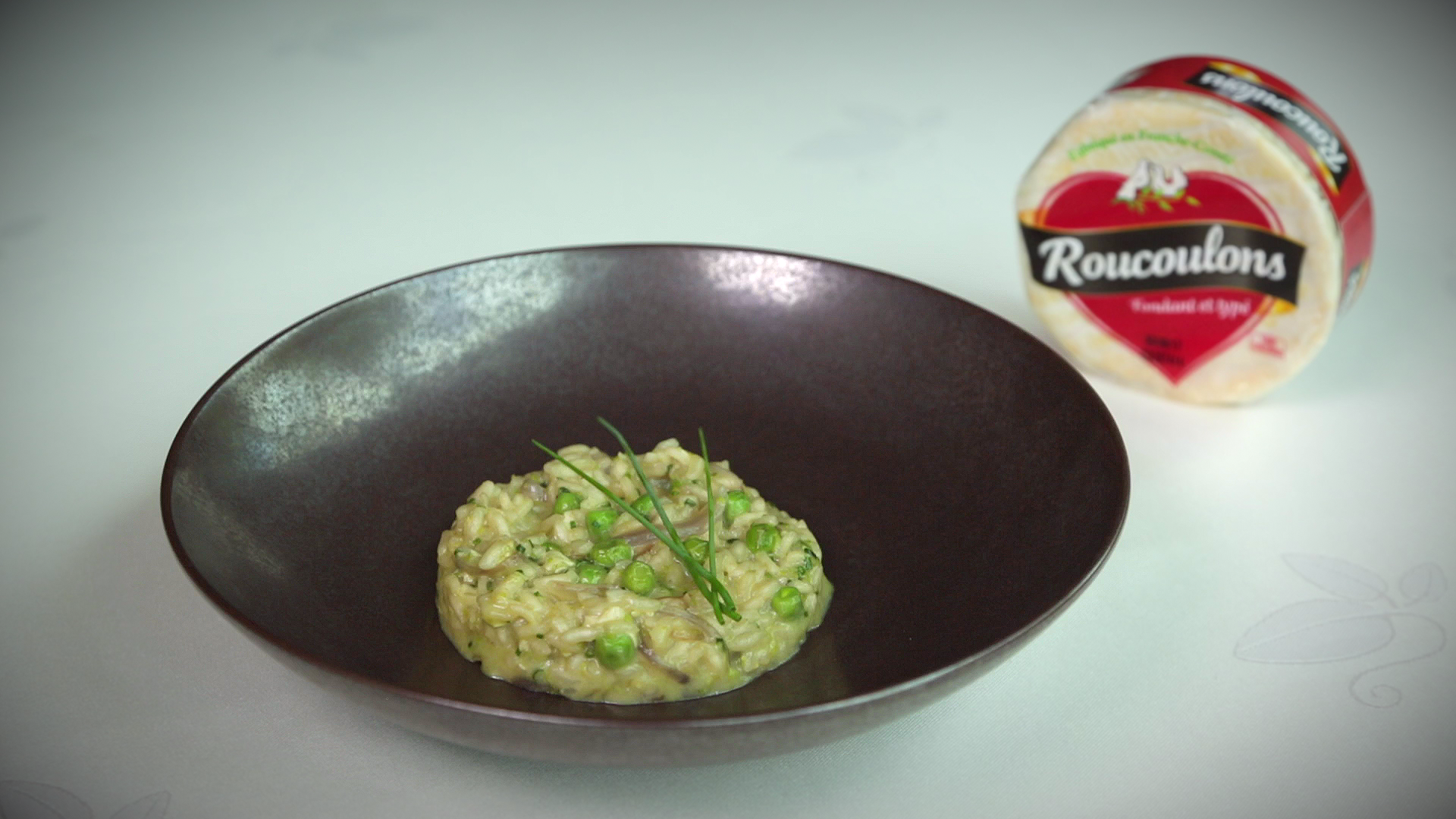 Risotto of fresh peas and Roucoulons with fried onions